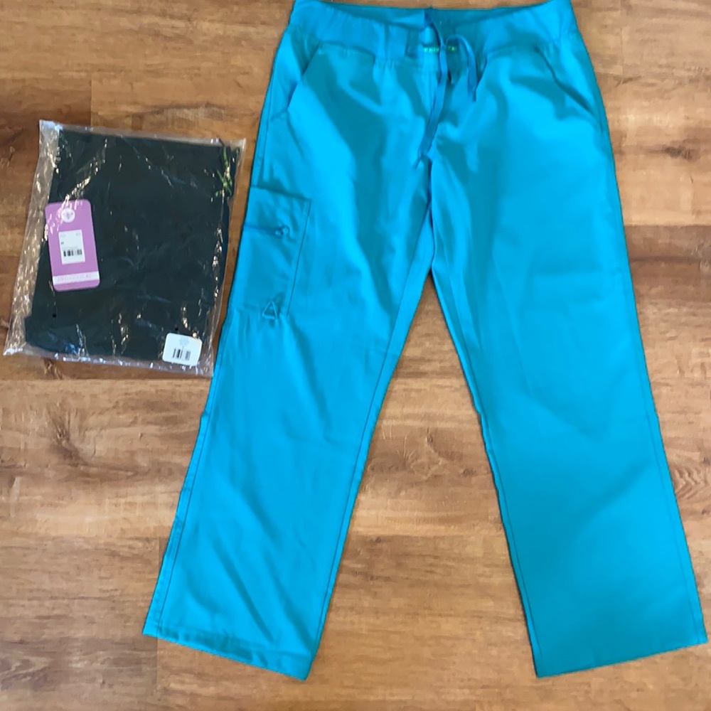 Women’s nursing scrubs. Two pairs.